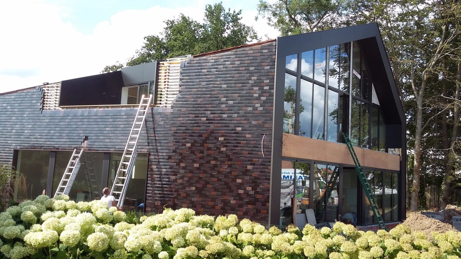 Dakwerken taliman - nagelstudio - gevelbekleding