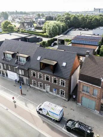 Dakrenovatie hellend/plat dak met zink- en koperwerk en gevelbekleding