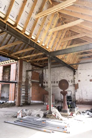 Dakrenovatie hellend/plat dak met zink- en koperwerk en gevelbekleding
