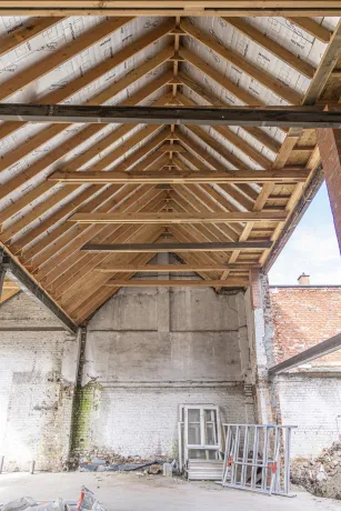 Dakrenovatie hellend/plat dak met zink- en koperwerk en gevelbekleding