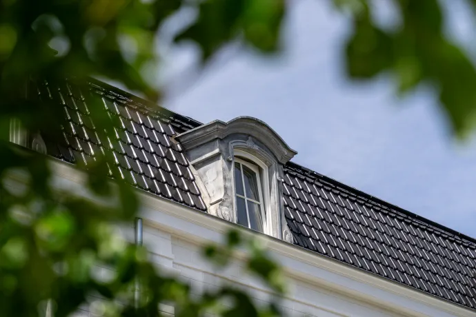 Dakrenovatie hellend/plat dak met zink- en koperwerk