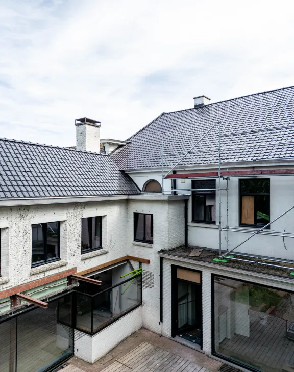Dakrenovatie plat dak met zink- en koperwerk